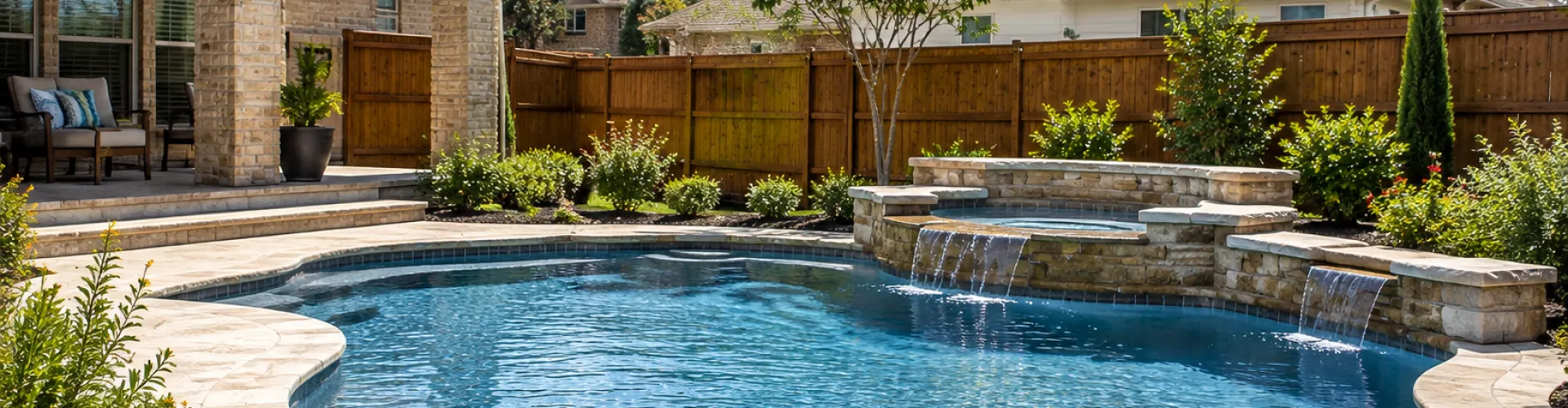 Renovated pool with waterfall and spa built by Fusion Pool Service