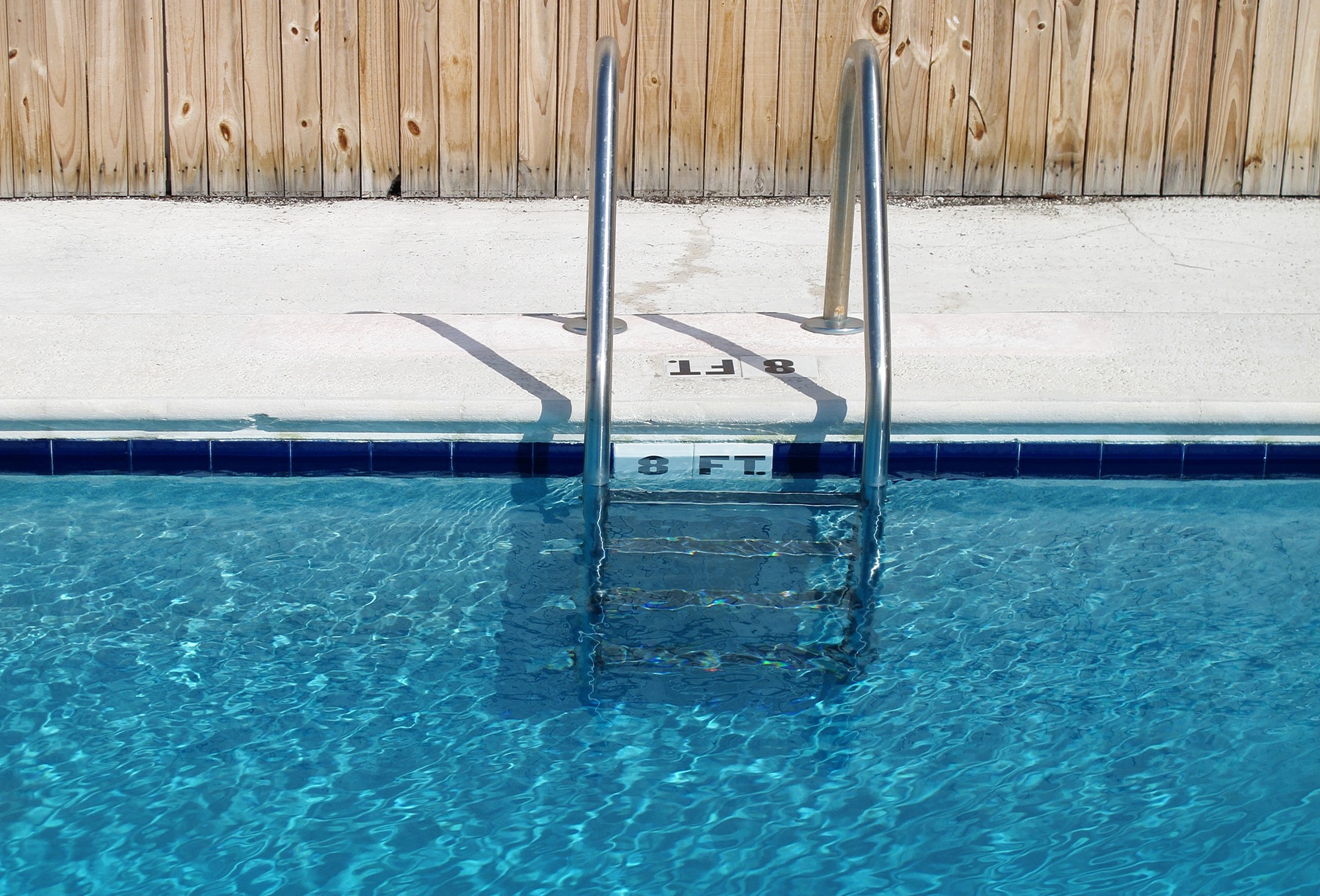 An image of swimming pool and ladder