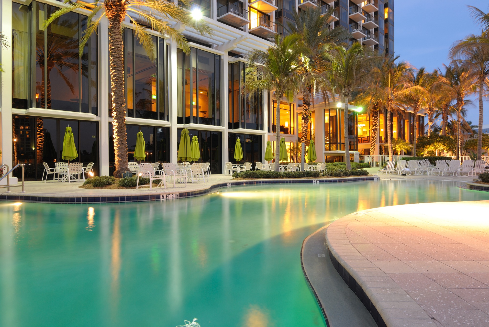 A resort swimming pool at twilight